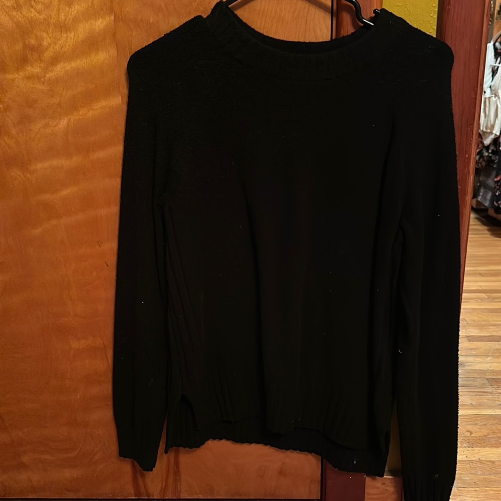 A black sweater thick material